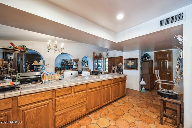1908 E Beck Ln, Phoenix, AZ 85022 - bathroom with a chandelier and recessed lighting