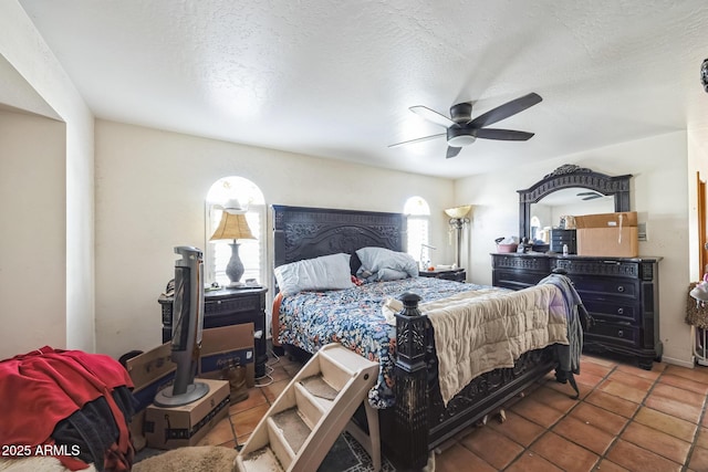 1908 E Beck Ln, Phoenix, AZ 85022 - bedroom with a ceiling fan, tile patterned floors, and a textured ceiling