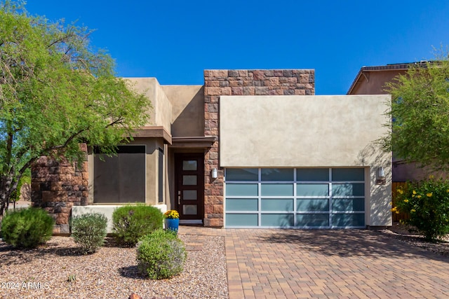 view of front of property featuring a garage