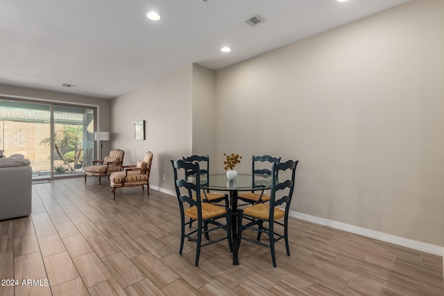 dining area with light hardwood / wood-style flooring