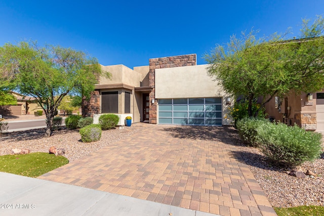 view of front of property featuring a garage