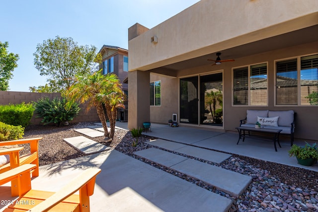 view of patio / terrace with outdoor lounge area and ceiling fan