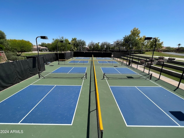 view of sport court featuring basketball hoop