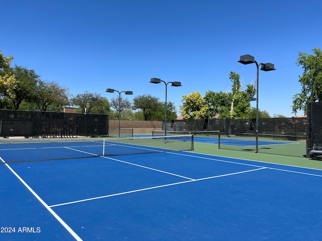 view of tennis court with basketball court