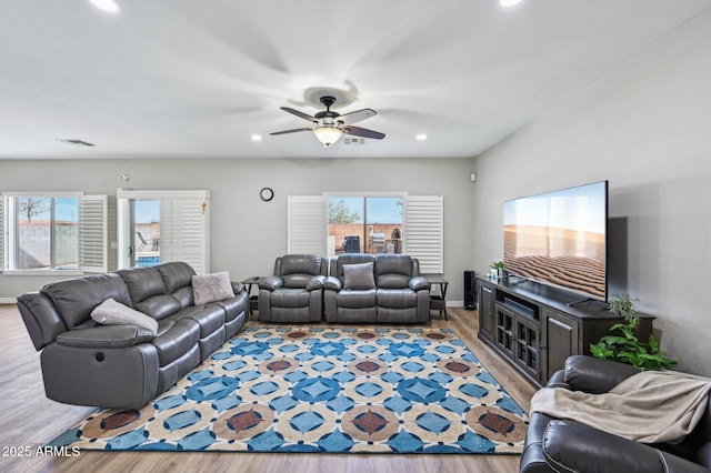 living room featuring recessed lighting, visible vents, wood finished floors, and a ceiling fan