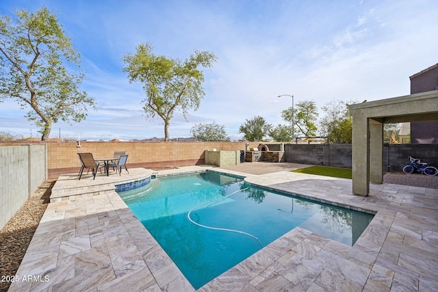 view of pool featuring a fenced in pool, a patio, and a fenced backyard