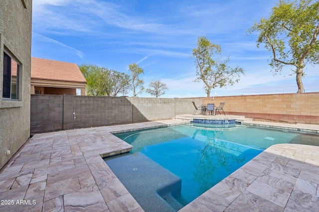 view of pool with a fenced in pool, a fenced backyard, and a patio area