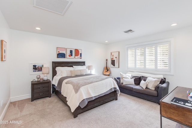 bedroom featuring recessed lighting, visible vents, and light colored carpet