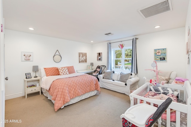 bedroom with baseboards, recessed lighting, visible vents, and light carpet