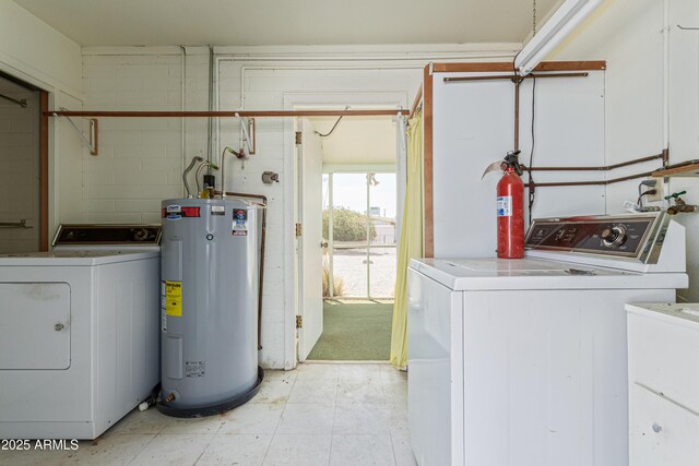 5309 E Butte St, Mesa, AZ 85205 - washroom with electric water heater, washing machine and dryer, and concrete block wall