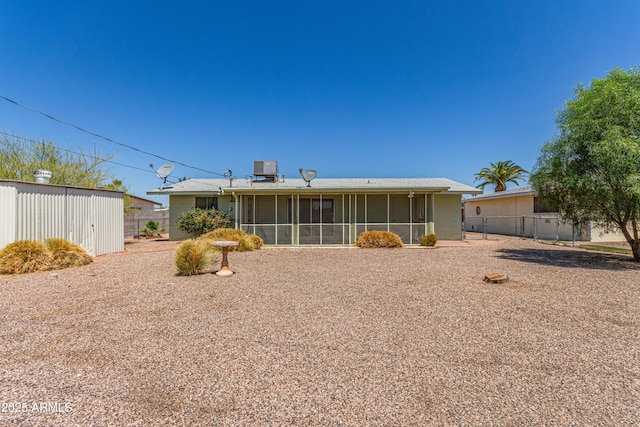 5309 E Butte St, Mesa, AZ 85205 - rear view of property with a sunroom