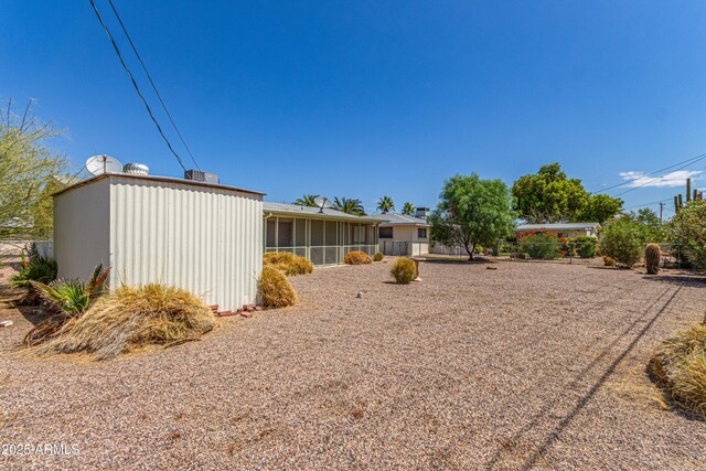 5309 E Butte St, Mesa, AZ 85205 - view of yard with a sunroom