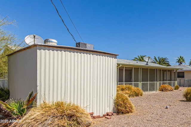 5309 E Butte St, Mesa, AZ 85205 - view of side of property with a sunroom