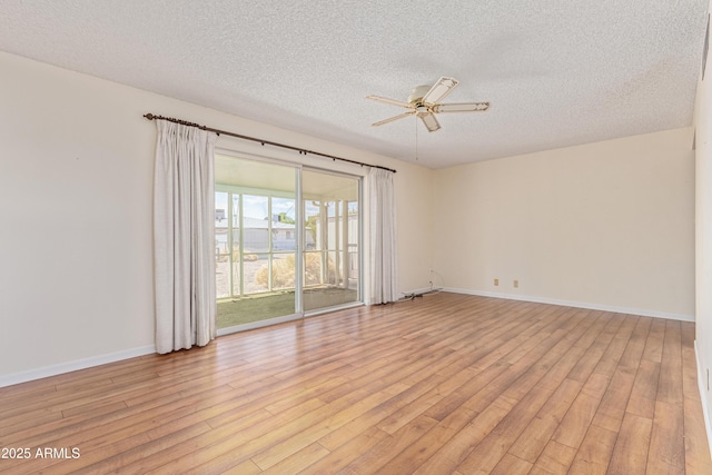 5309 E Butte St, Mesa, AZ 85205 - empty room featuring a textured ceiling, ceiling fan, and light wood-style flooring