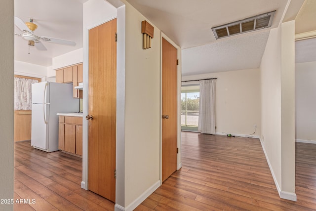 5309 E Butte St, Mesa, AZ 85205 - corridor featuring hardwood / wood-style flooring and baseboards