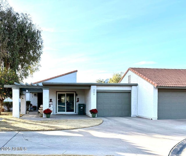 single story home featuring a garage