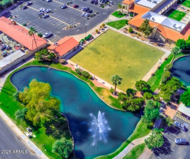 drone / aerial view with a water view