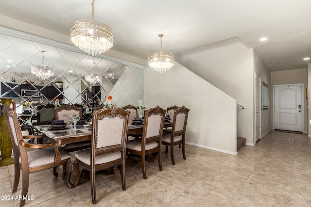 dining area with an inviting chandelier