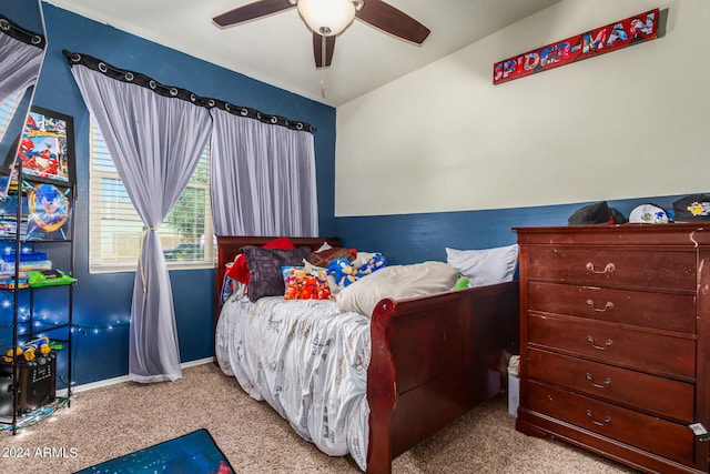 carpeted bedroom featuring ceiling fan