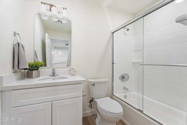 5420 W Grove St, Laveen, AZ 85339 - bathroom featuring vanity, shower / bath combination with glass door, and wood finished floors