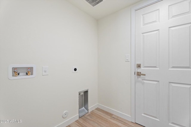 5420 W Grove St, Laveen, AZ 85339 - washroom featuring hookup for an electric dryer, light wood finished floors, washer hookup, and hookup for a gas dryer