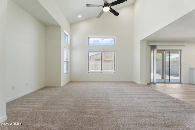 5420 W Grove St, Laveen, AZ 85339 - unfurnished room featuring a ceiling fan, carpet, and high vaulted ceiling