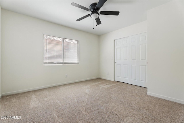 5420 W Grove St, Laveen, AZ 85339 - unfurnished bedroom featuring carpet floors, a closet, and ceiling fan