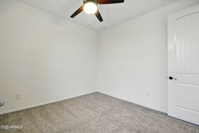 unfurnished room with carpet floors, ceiling fan, and baseboards
