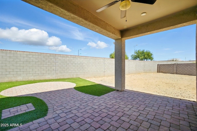 view of patio / terrace featuring a fenced backyard and ceiling fan