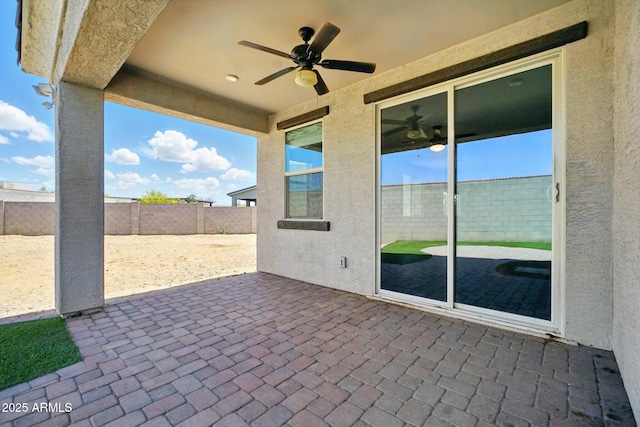 view of patio / terrace featuring a fenced backyard and ceiling fan