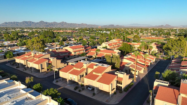 birds eye view of property featuring a mountain view