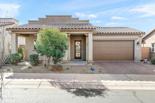 view of front of home with a garage