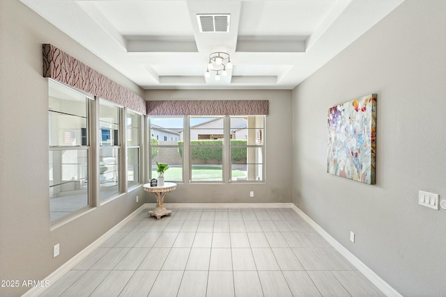 interior space with coffered ceiling