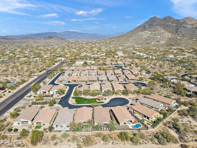 bird's eye view with a mountain view