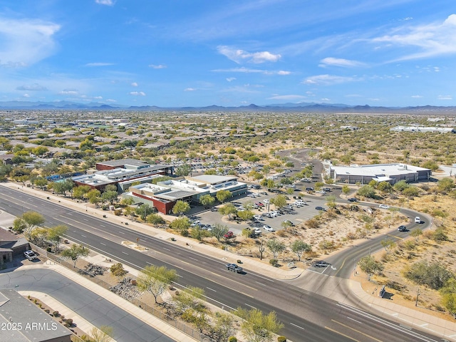 drone / aerial view featuring a mountain view