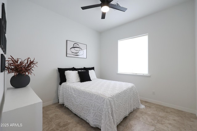 bedroom with baseboards and ceiling fan