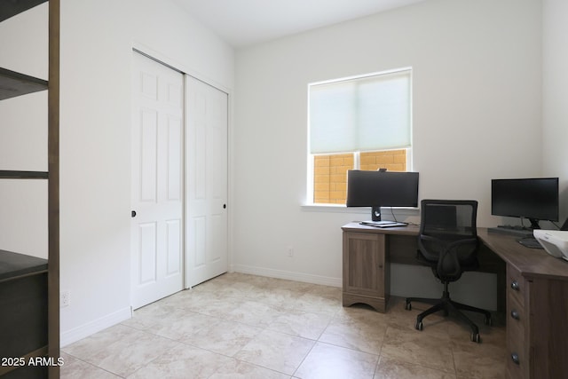 office space featuring baseboards