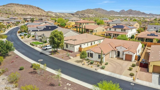 birds eye view of property featuring a residential view and a mountain view