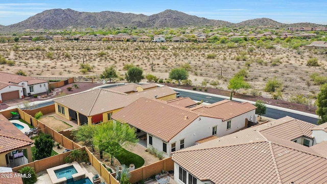 bird's eye view featuring a residential view and a mountain view