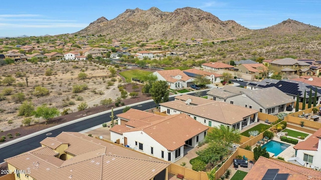 bird's eye view featuring a mountain view and a residential view