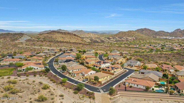 bird's eye view with a residential view and a mountain view
