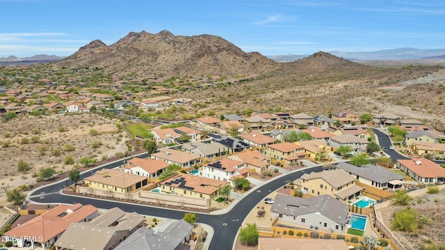 aerial view featuring a mountain view and a residential view