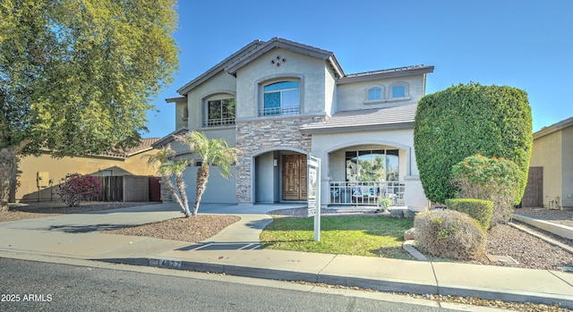 view of front of property with a garage