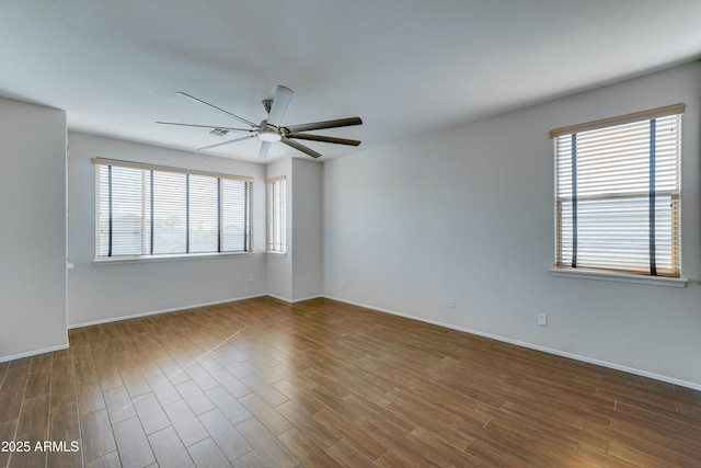 spare room with ceiling fan