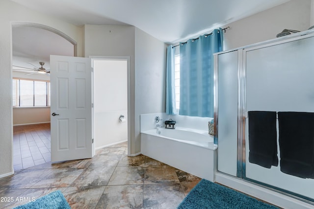 bathroom featuring ceiling fan, tile patterned floors, and independent shower and bath