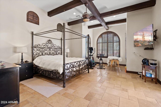 bedroom featuring beam ceiling and ceiling fan