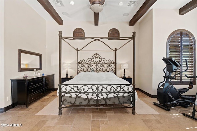 bedroom featuring beam ceiling and ceiling fan