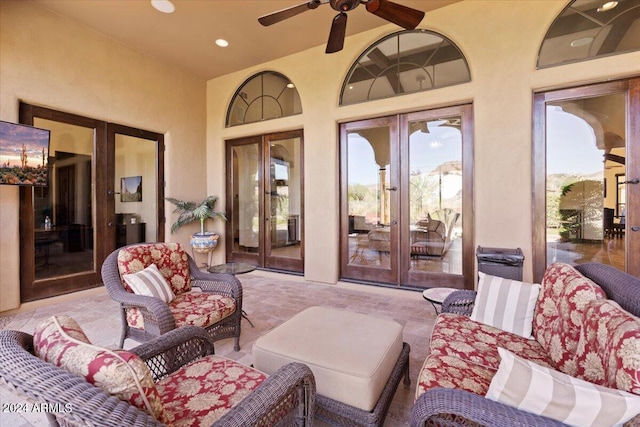 view of patio with french doors, an outdoor living space, and ceiling fan