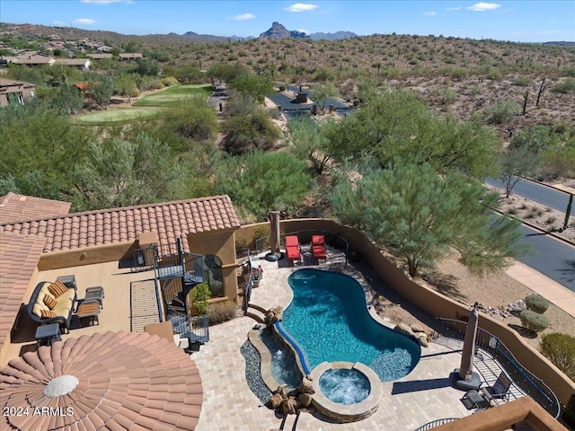 view of pool featuring a patio