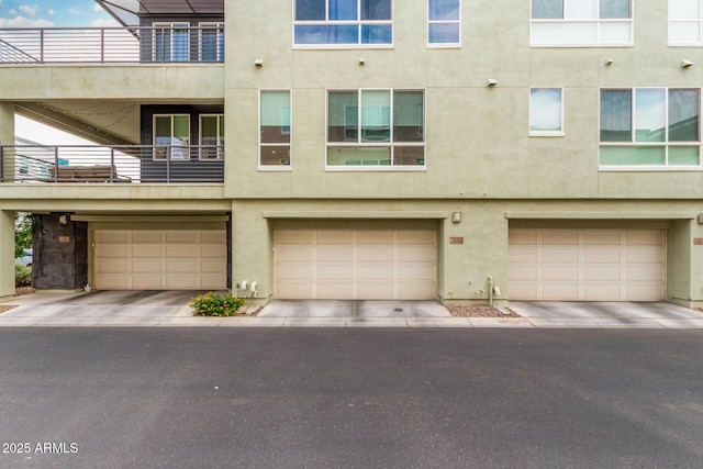 1250 N Abbey Ln Unit 206, Chandler, AZ 85226 - view of building exterior with an attached garage
